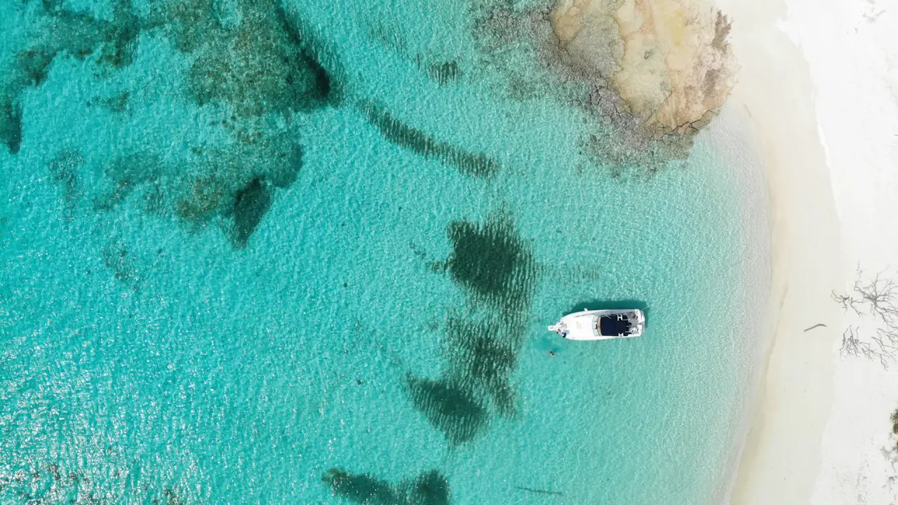 A luxury yacht on turquoise water